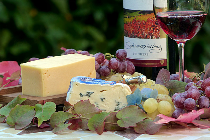 Cheeseboard With Wine And Table Grapes